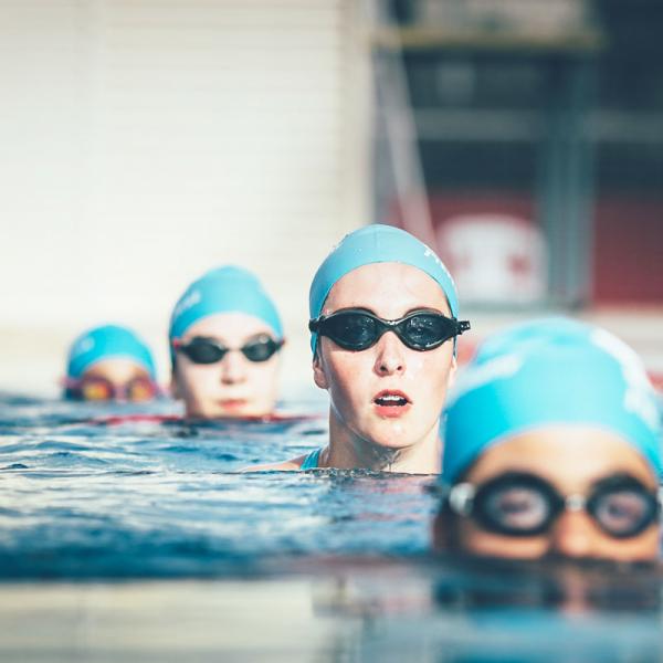 Teens ready for training in swimming pool Teens ready for training in swimming pool