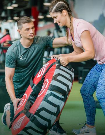 coach instructing on wheel flip