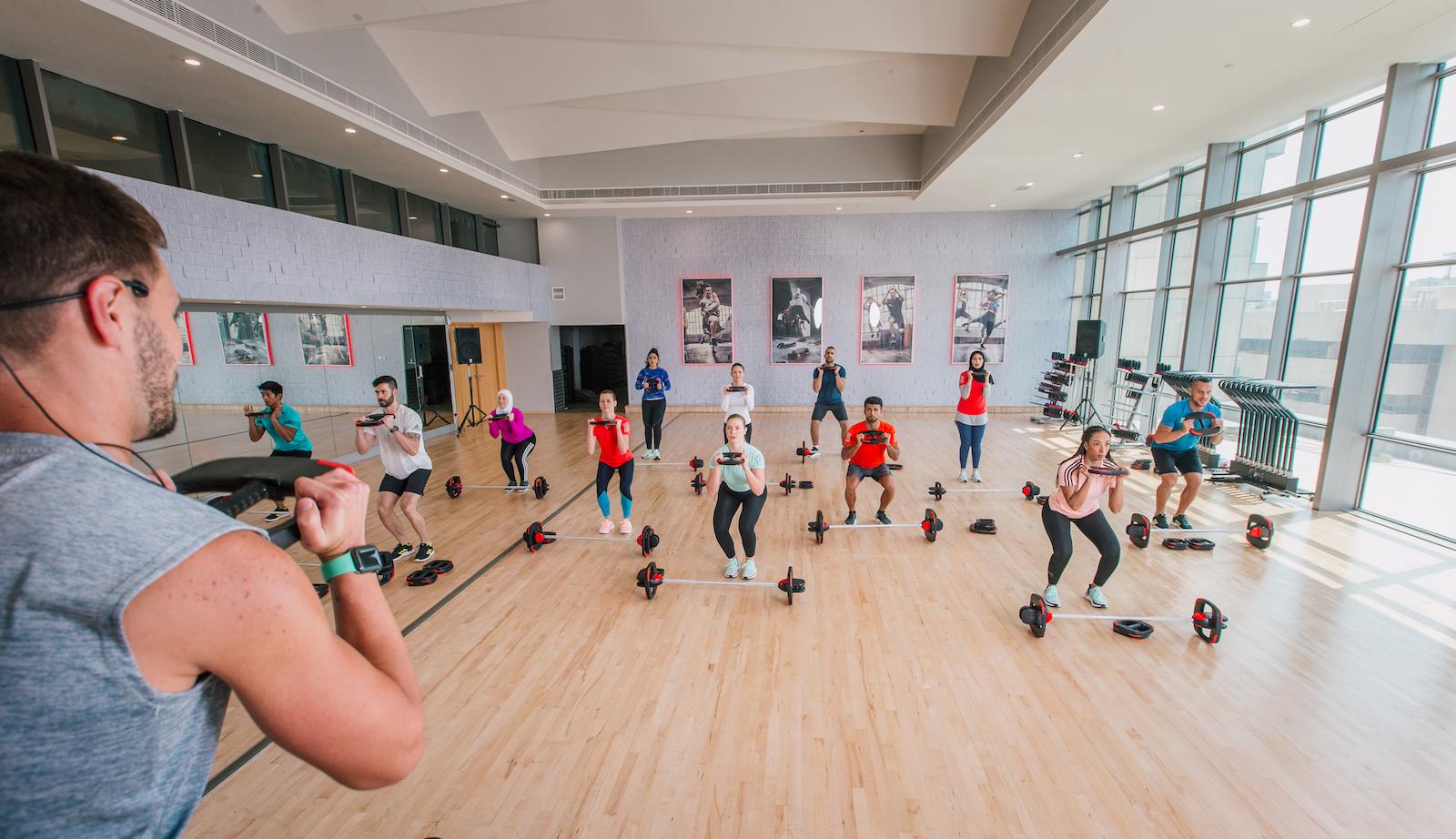 Classes cover image Fitness First group exercise in workout studio