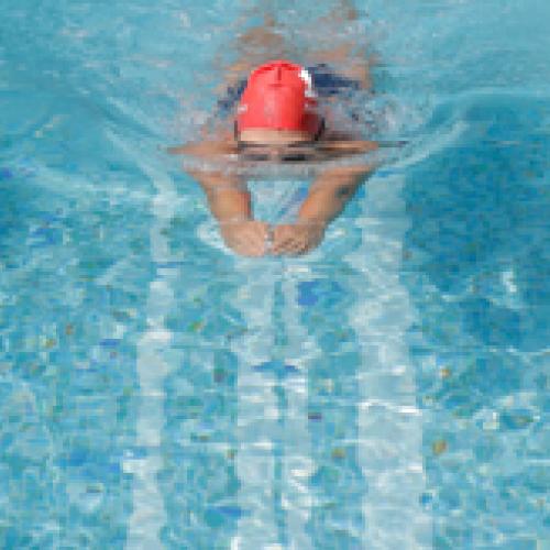 athlete performing kick swimming