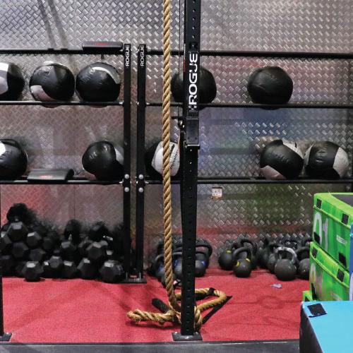 Fitness First X-FIT Uptown Mirdif medicine balls and dumbbells