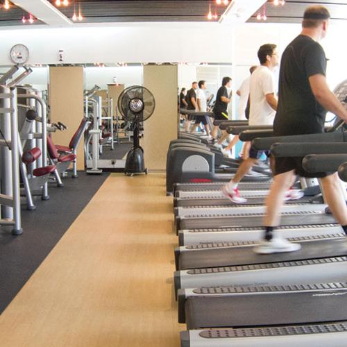 Fitness First Town center members running on treadmills