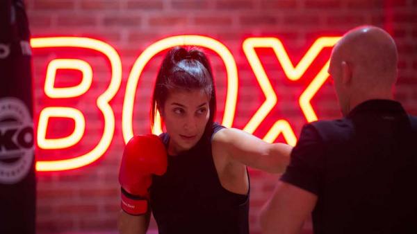female Fitness First member in X-FIT BOX training program female Fitness First member in X-FIT BOX training program