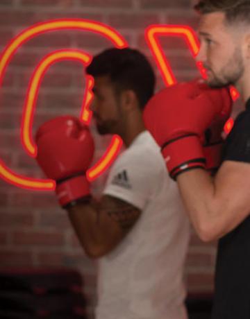 Fitness First members group boxing training session Fitness First boxing group training