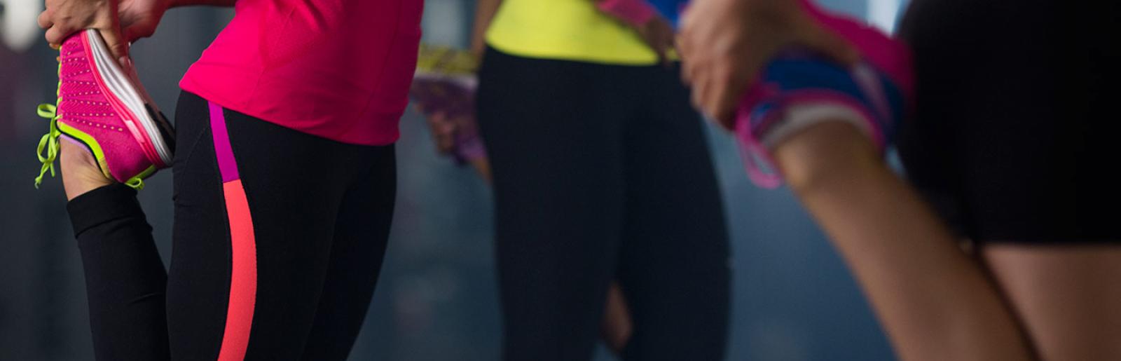 Female Fitness First member running in place